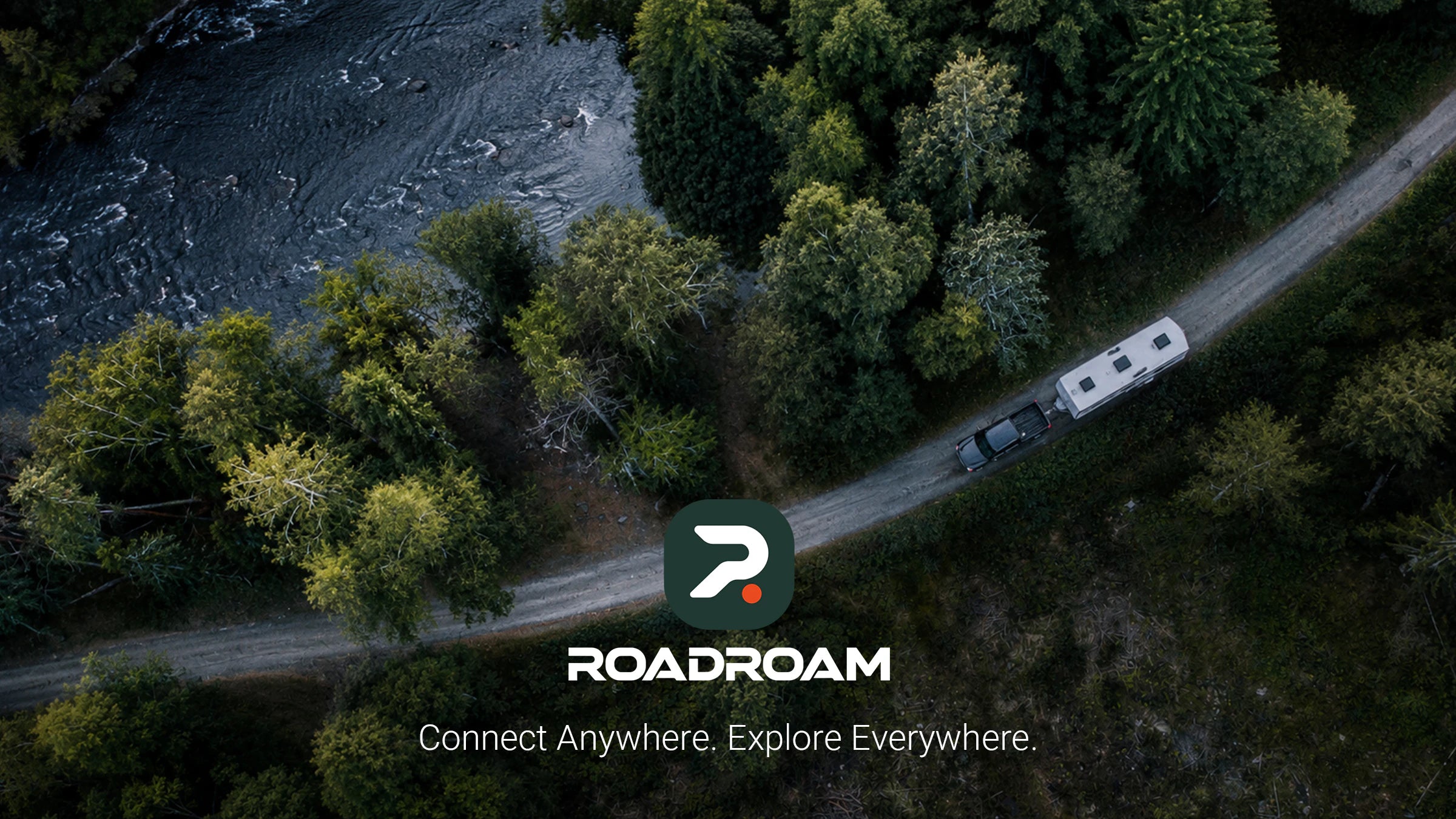RV following a road through a forest